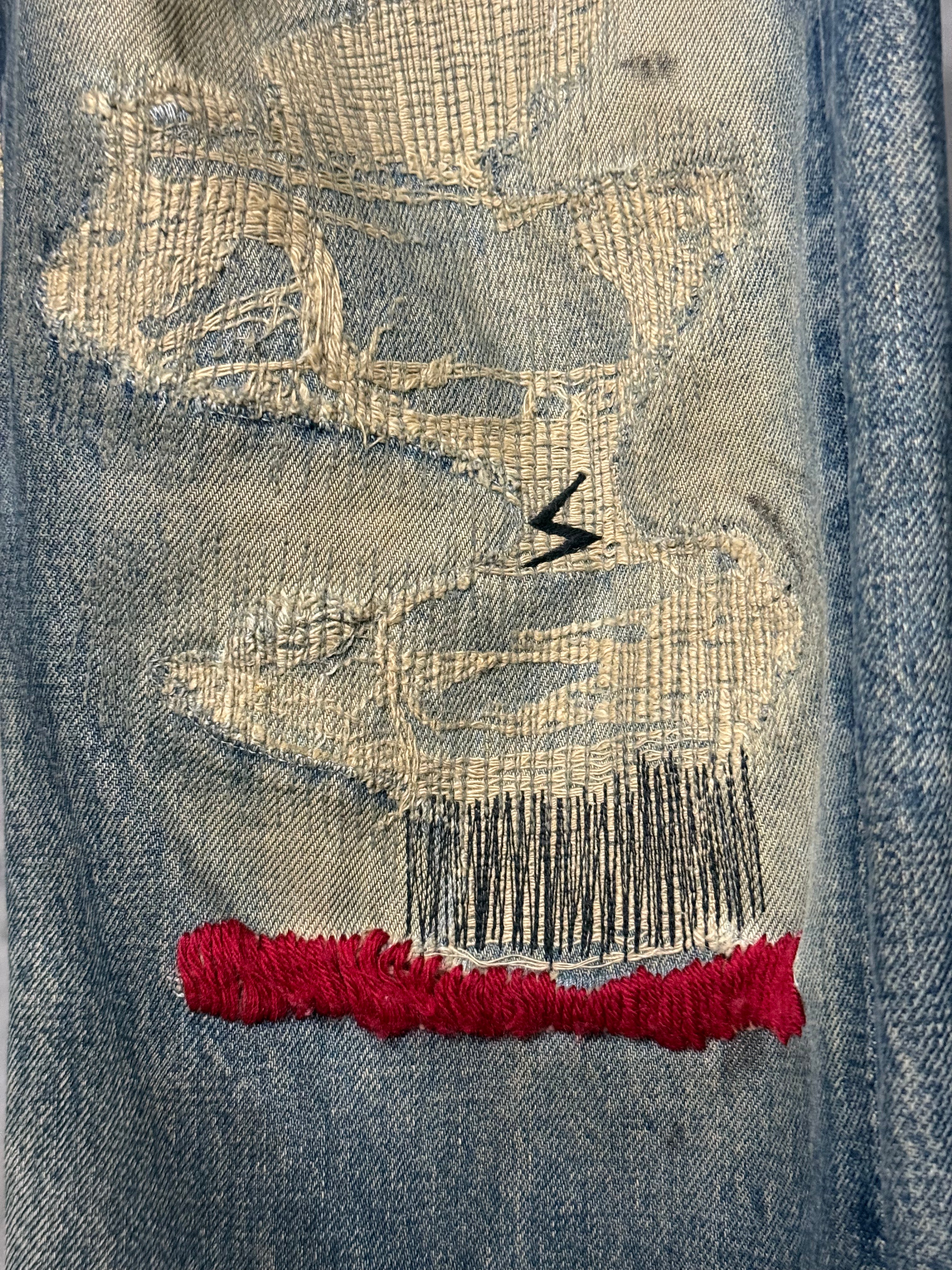 Undercover AW05 Red Yarn 64 Denim Jeans